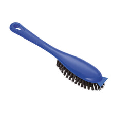 The Haug Bürsten KG UPHOLSTERY BRUSH features a blue PP handle, robust black 0.35-mm bristles (25 mm high), and a small scraper - ideal for cleaning upholstered furniture.
