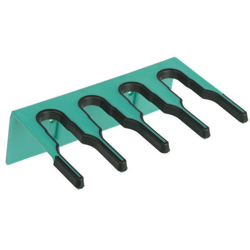 The Haug Bürsten KG PLASTIC DEVICE STRIP 200X70X125 MM is a green wall shelf with four black U-shaped slots for organizing tools or cleaning equipment.