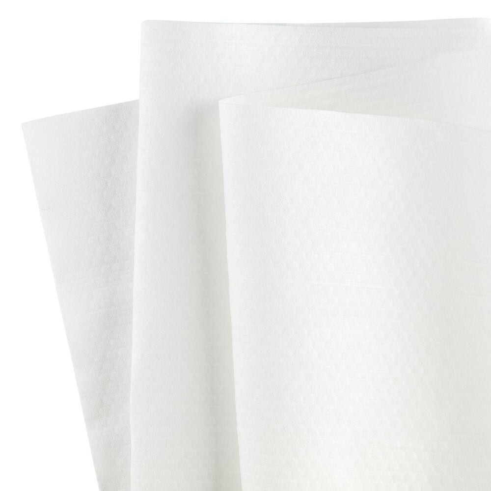 Three white WypAll® X70 PowerClean towels from Kimberly-Clark GmbH are shown overlapping, displaying their subtle pattern and suitability for industrial cleaning. Each BRAG™ Box contains 200 sheets, ideal for tough cleaning tasks.