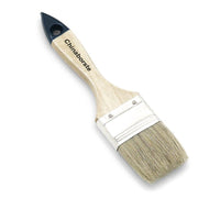 The Nölle Profi Brush Flat Brush No. 5 from Nölle Profi Brush Bürsten- & Pinseltechnik e.K. features a wooden handle with a black tip and the inscription “Chinaborste.” The light brown bristle blend is flat and secured by a tinplate ferrule for long-lasting durability.