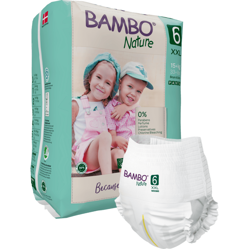 Pictured is a pack of Bambo Nature Pants from Abena Re-Seller GmbH for children over 15 kg with two smiling children in hats and overalls on the packaging. In the foreground, a single diaper is visible.