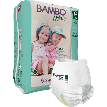 Pictured is a pack of Bambo Nature Pants from Abena Re-Seller GmbH for children over 15 kg with two smiling children in hats and overalls on the packaging. In the foreground, a single diaper is visible.
