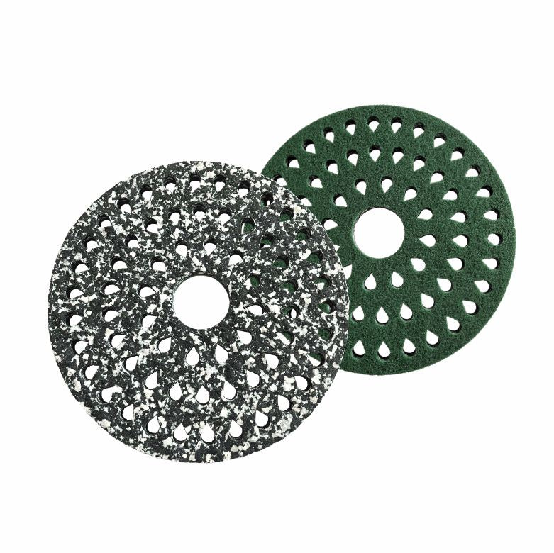 Two Arcora Pu-Pads Light (Waterdrop System) for small scrubber-driers: one speckled black and white, one solid green, both round with a center hole. Ideal for maintenance cleaning by Arcora International GmbH.