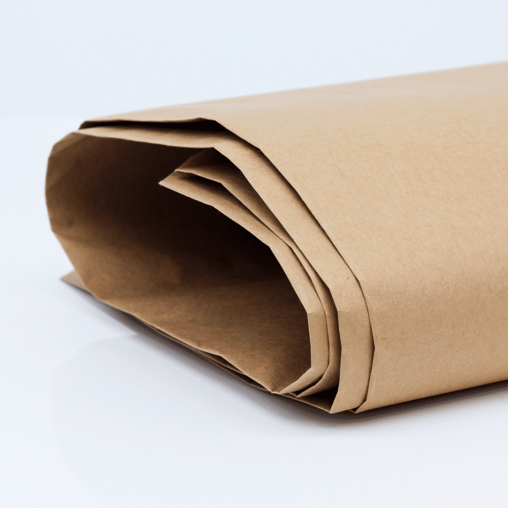 A neatly arranged stack of DEISS paper bags, each with the print "WASTE" and waterproof kraft paper, lies on a white surface in front of a simple background, showcasing their smooth, textured appearance. This set produced by EMIL DEISS KG (GmbH + Co.) contains 25 pieces of the robust, compostable sheets.