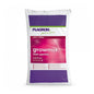 The image shows a white bag of Plagron Growmix 50 l – without perlite from Bertels B.V. with purple and pink accents and the inscription "Premium potting soil, pre-fertilized for 100% Terra fertilization, to ensure healthy plant growth".