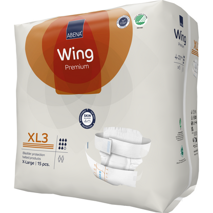 Eine Packung ABENA Wing Premium Erwachsenenwindeln der Abena Re-Seller GmbH (15 Stück) kommt in einer meist weißen Verpackung mit orangen und braunen Akzenten, mit ultimativem Schutz und detaillierten Größenangaben.