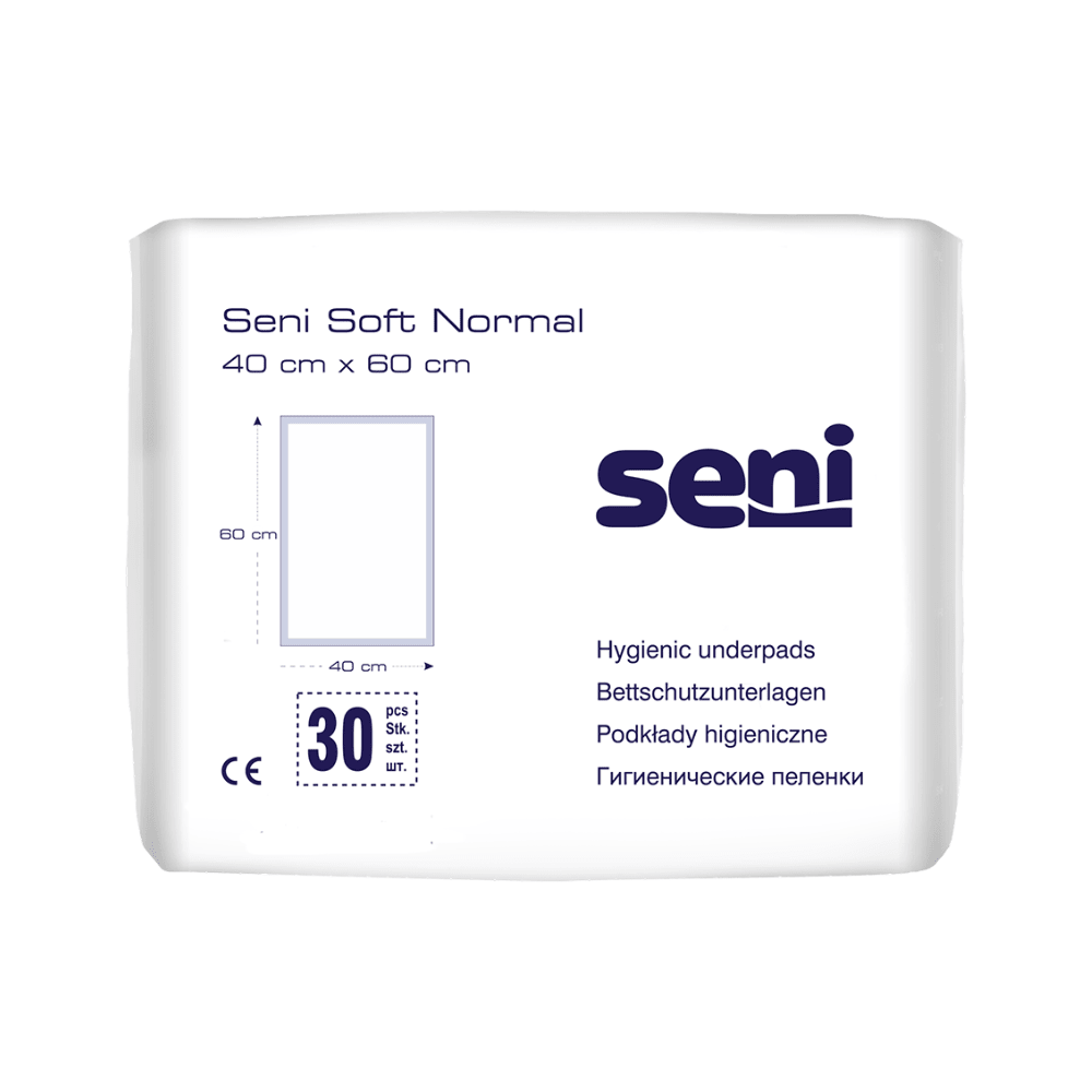 One package Seni Soft Normal bed pads from TZMO Deutschland GmbH (40 x 60 cm). The white package with blue text and graphics contains 30 pads and offers reliable protection and information in multiple languages.