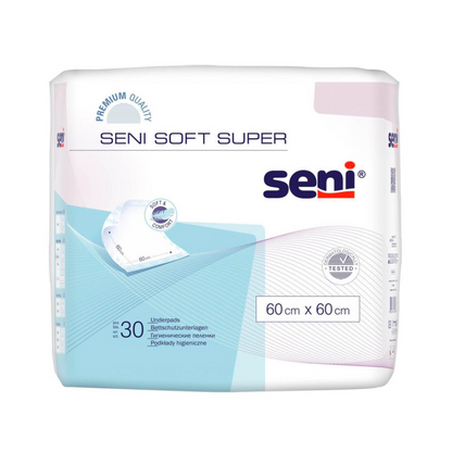 A pack of Seni Soft Super bed protection pads from TZMO Deutschland GmbH, 60x60 cm, 30 pieces. The predominantly white packaging with blue and violet accents contains product information, logos, and a safety label for security.