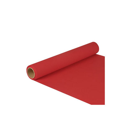 A roll of PAPSTAR table runner tissue "ROYAL Collection" in the size 5 m x 40 cm unfolds in a strong shade of red on a white background.