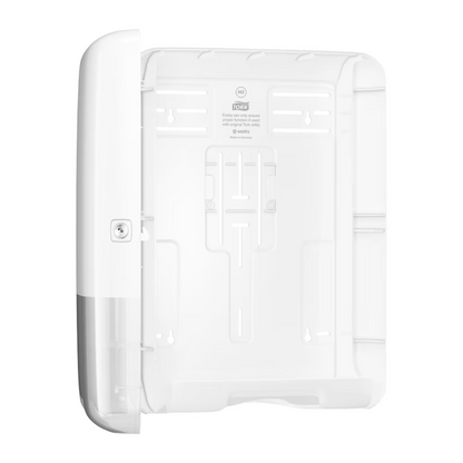 The Tork 553000 dispenser for zigzag towels Elevation H3 from TORK – Essity Professional Hygiene Germany GmbH is a white, wall-mounted plastic holder with an open elevation design. It has compartments and slots for secure storage of items and a keyhole on the left side for locking, making it ideal for organizing or securing components.