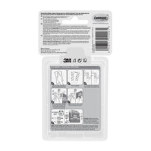 Die Rückseite eines 3M Deutschland GmbH Multipack Command™ Strips, transparent 17200CLR, zeigt eine bebilderte Anleitung zum Anbringen und Entfernen der Streifen, Produktinformationen, Warnhinweise und einen Barcode für spurlose Wandbefestigung.