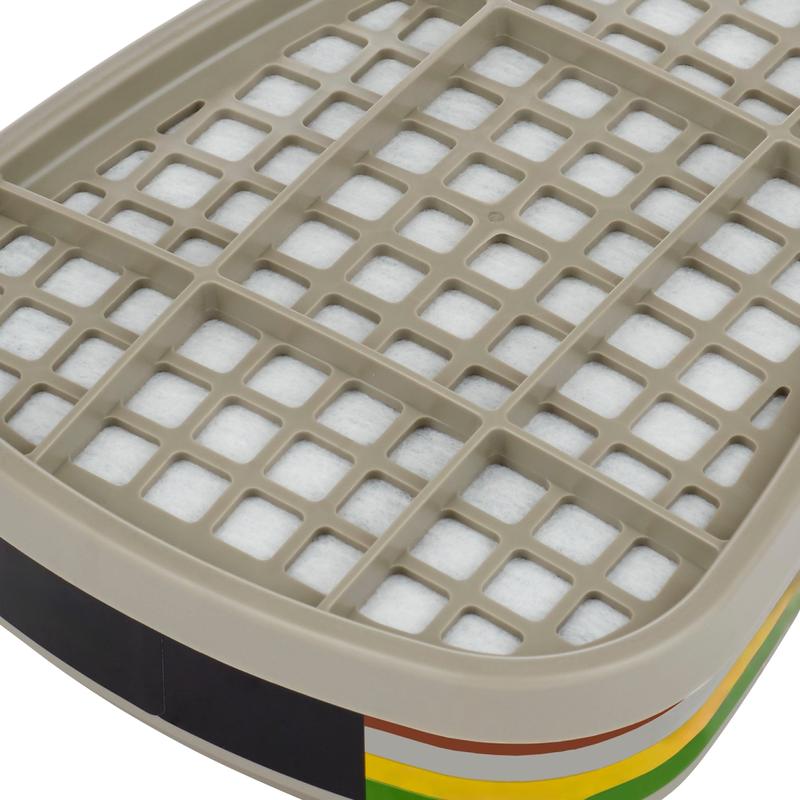 Close-up of a beige plastic grid over a white filter in a rectangular container with multicolored stripes, resembling the 3M™ Filter Cartridge 6059, ABEK1 Combination Filter (1 Pair/Pack) from 3M Deutschland GmbH.