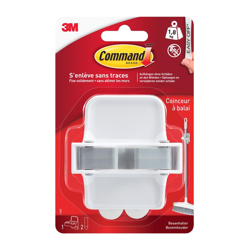 Ein weißer Command™ Besenhalter 17007-FR von 3M Deutschland GmbH in einer Kunststoffverpackung mit rotem Hintergrund, französischem Text, Command Klebestreifen-Branding und einer Besenabbildung neben dem Halter.