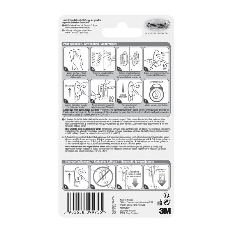 Die Rückseite einer Command™ Kleider-Haken, 17019-FGN-Verpackung der 3M Deutschland GmbH zeigt eine bebilderte Schritt-für-Schritt-Anleitung für die Wandbefestigung ohne Bohren, Warnhinweise, Produktdetails, den Barcode und den 3M Schriftzug in schwarz-weiß.