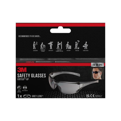 A retail package of 3M™ Virtua™ AP safety glasses, gray lens from 3M Deutschland GmbH. The box highlights eye protection, 99.9% UV protection, product images, and symbols for applications like gardening and carpentry.