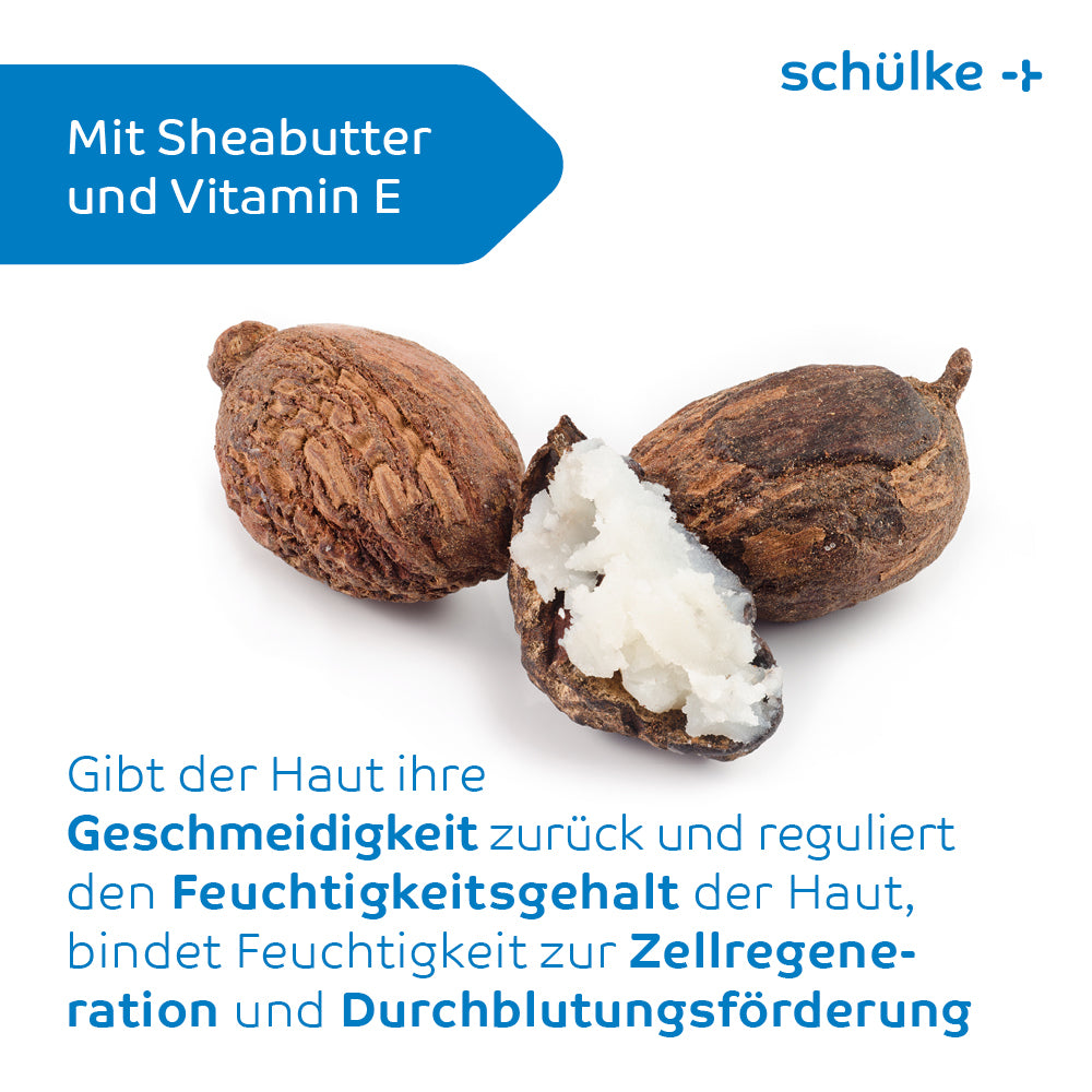 Three shea nuts, one of which is cut open revealing its creamy interior, are centered on a white background. The text in German highlights the benefits of shea butter and vitamin E for skin smoothness, moisture supply, cell regeneration, and blood circulation - a perfect blend for Schülke & Mayr GmbH Schülke esemtan® dry skin balm, Body Care Balm - 500 ml | Bottle (500 ml).