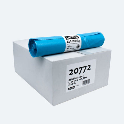 On a white box with the inscription "20772" lies a roll of blue garbage bags, known for their tear resistance. The box contains 25 garbage bags from the DEISS LDPE garbage bag Type 60 collection with dimensions 575 x 1100 mm. The label shows the brand name "EMIL DEISS KG (GmbH + Co.)".